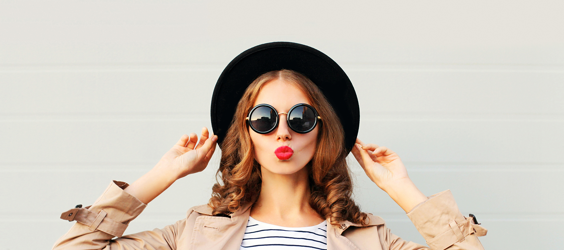 Woman With Round Sunglasses Hat And Red Lipstick
